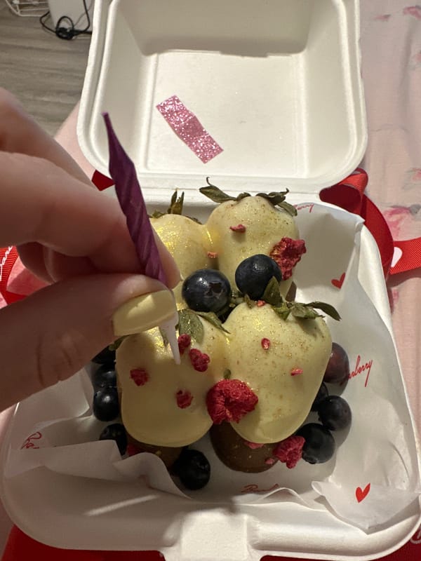 Woman receives chocolate berries from Barberry shop in Perm