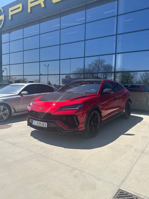 Red Lamborghini Urus spotted parked outside modern building in Plovdiv