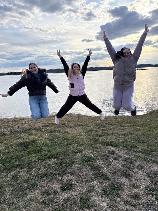 Friends gather for spring outing near water in Шолья, Russia