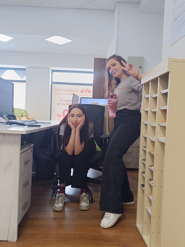 Woman shows signs of distress in Sofia office setting