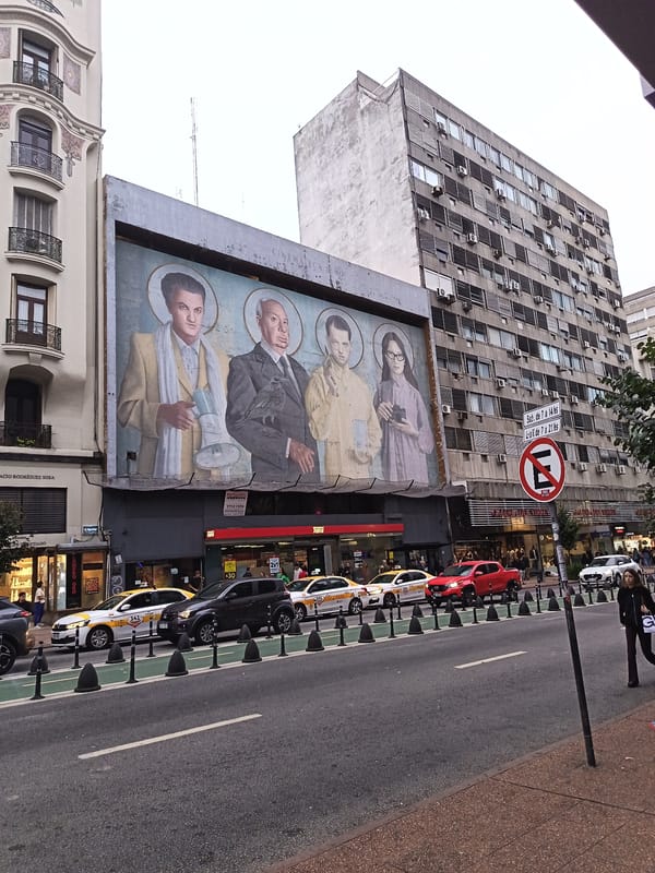 Religious mural featuring four haloed figures spotted in Montevideo