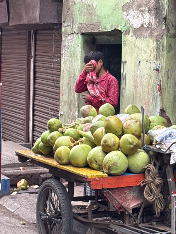 Street vendors, rickshaw driver captured in early morning Kolkata scenes