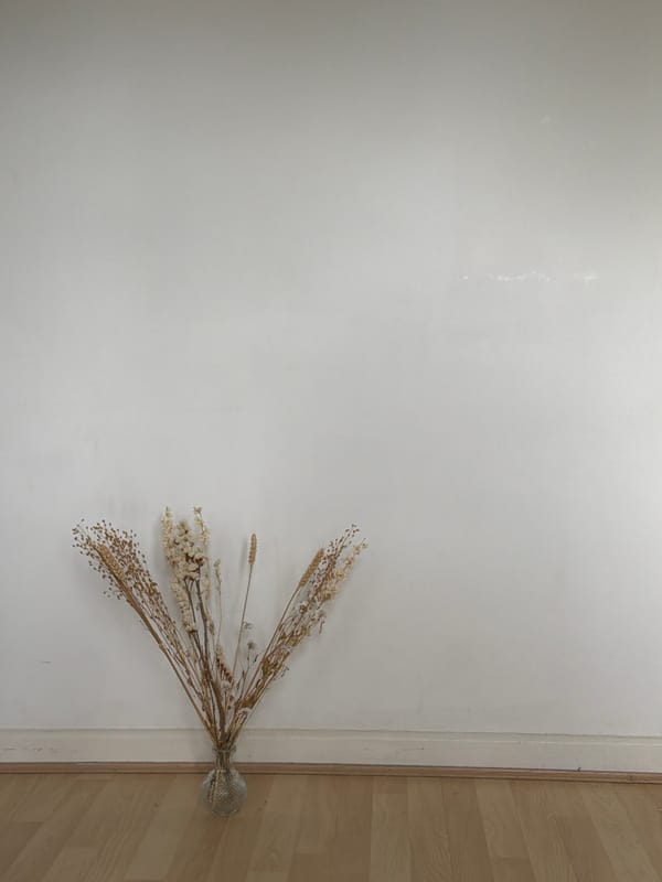 Dried wheat arrangement documented in London home setting