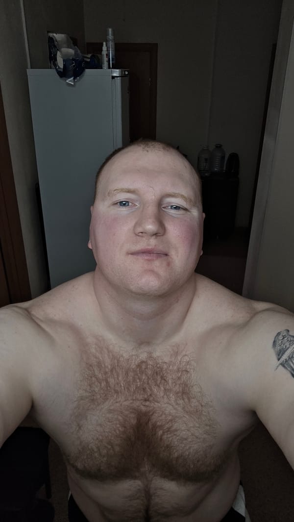 Man takes selfie indoors in Russia
