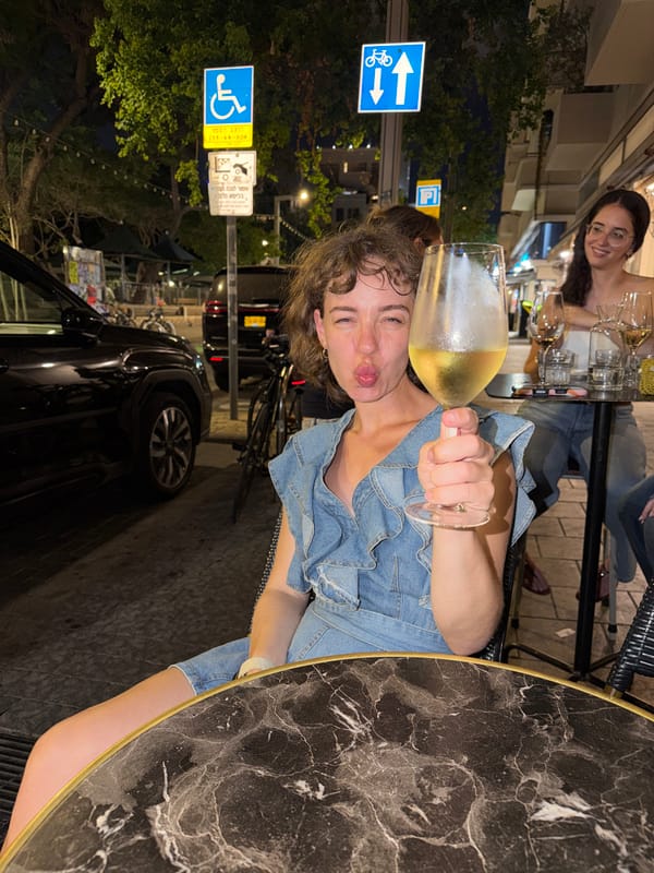 Nighttime cafe wine moment in Tel Aviv