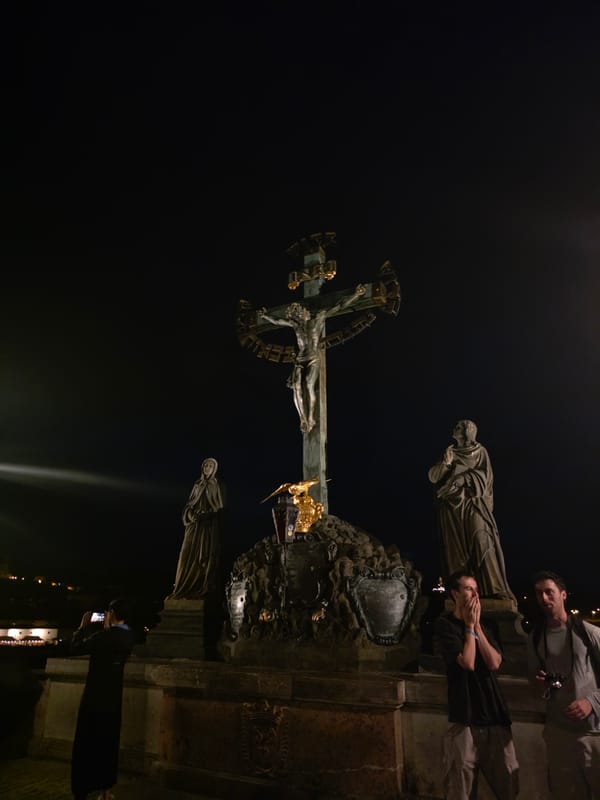 Night on Charles Bridge, Prague's historic river crossing