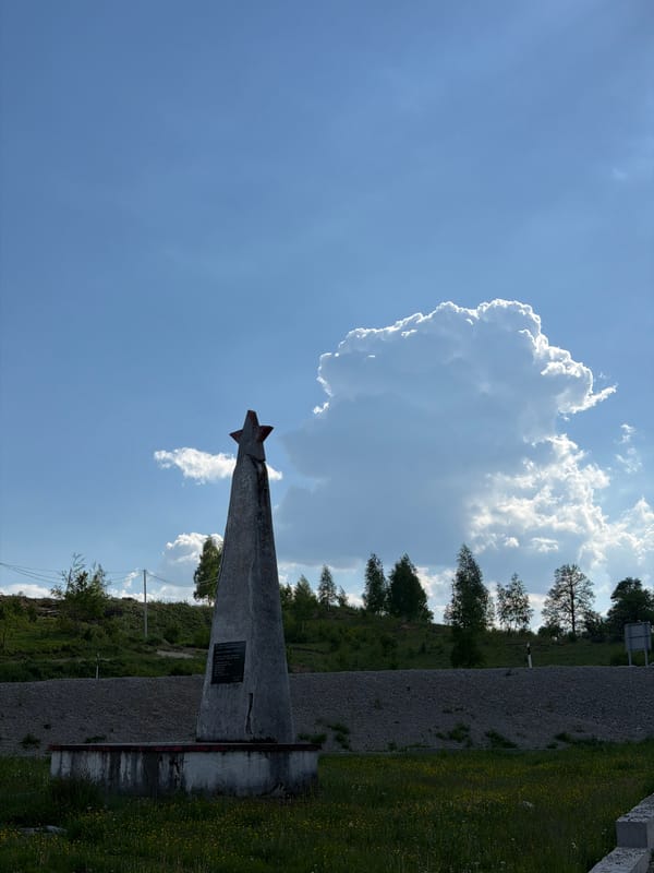 Star-topped triangular monument photographed in Marina Šuma, Montenegro