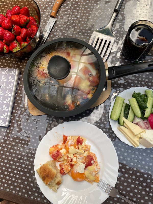 Seaside breakfast spread on a sunny morning terrace