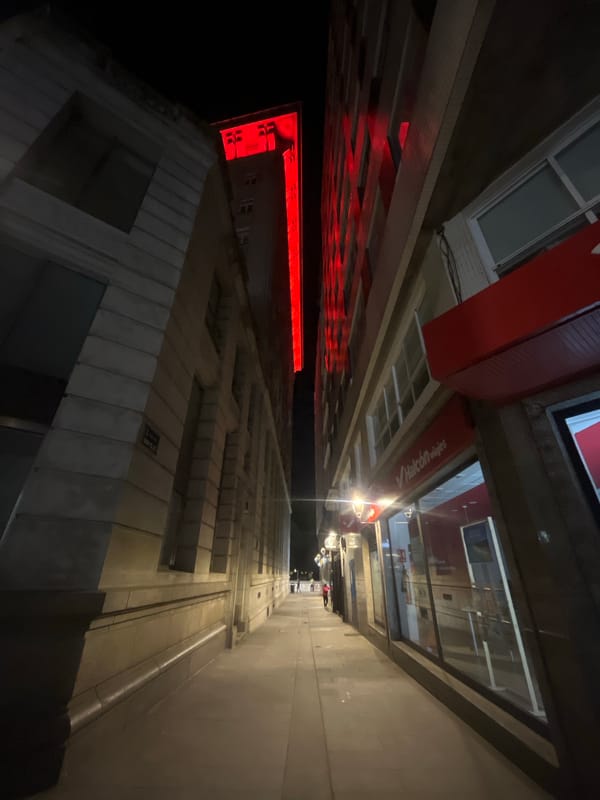 Nighttime architectural documentation on Rúa Compostela, A Coruña