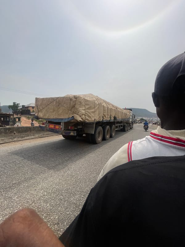 Road scene captured from moving vehicle in Lokoja, Nigeria