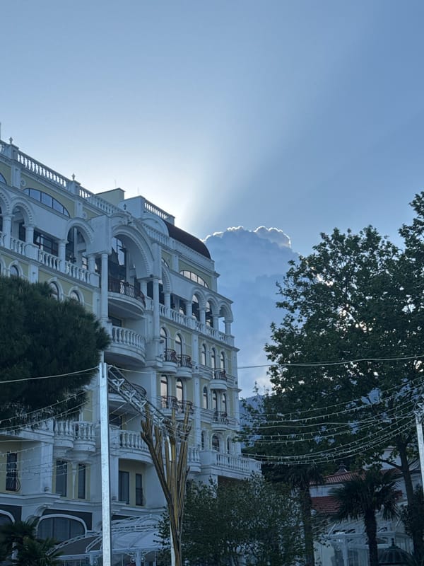 Tourist activities documented along Yalta waterfront during sunny afternoon