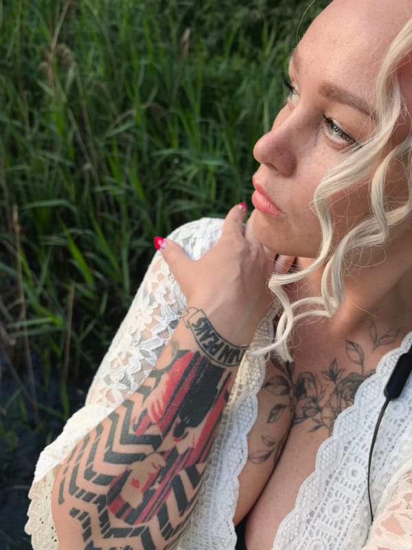 Waterside portraits and bulldog lounging on wooden pier in Noviy