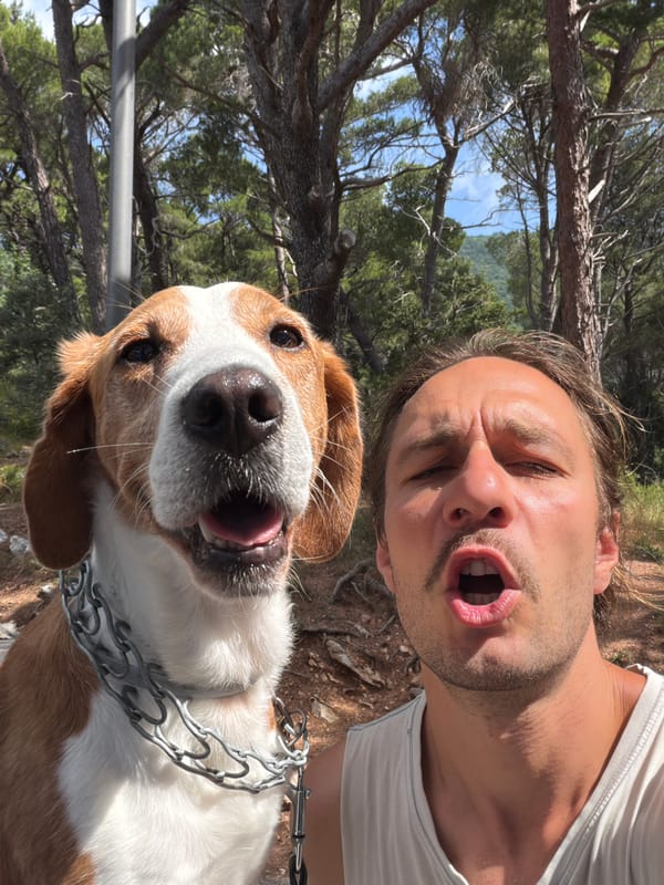 Man takes expressive selfie with dog in Montenegro