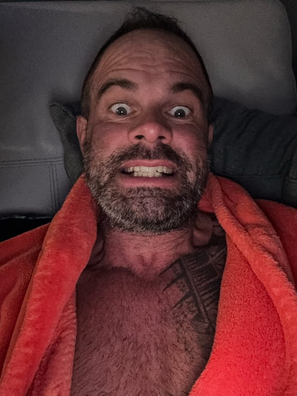 Man takes selfie in Belgian home with stag artwork