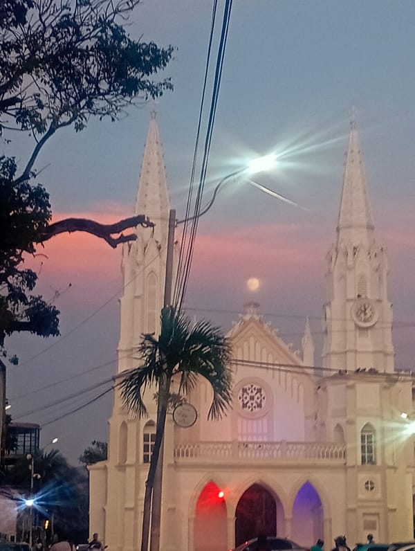 Sunset documented over Juan Griego bay and historic church