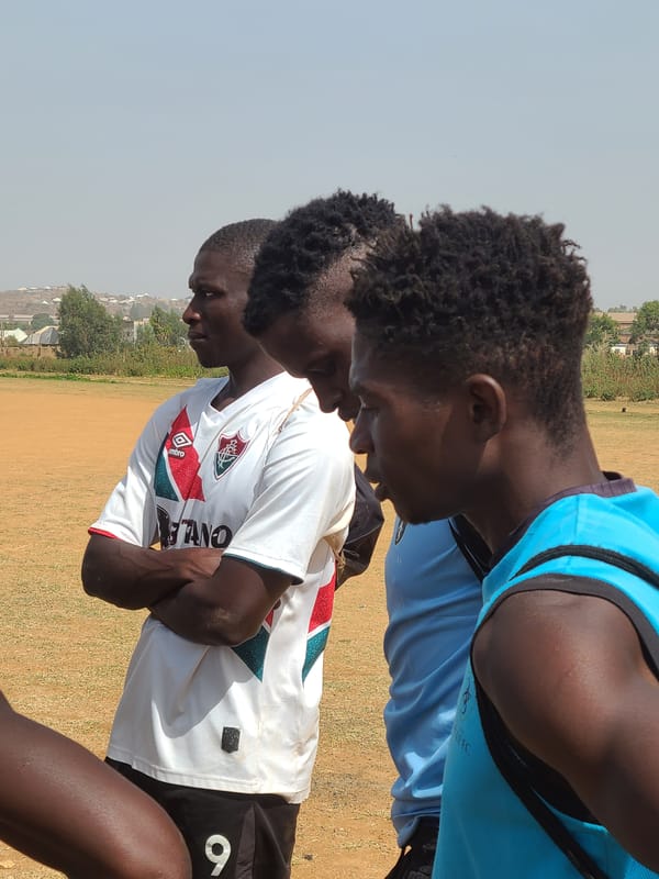 Young athletes gather for team activities on Nigerian field