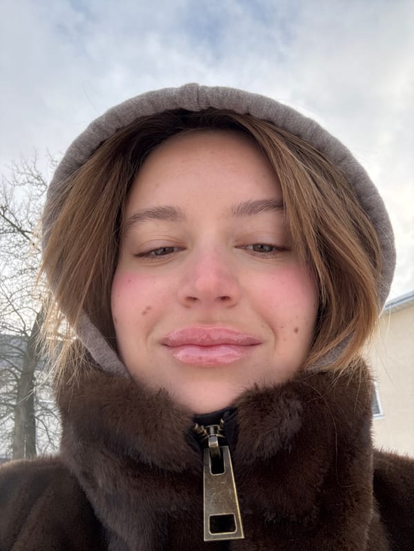Woman photographed on snowy street in Hrodna, Belarus