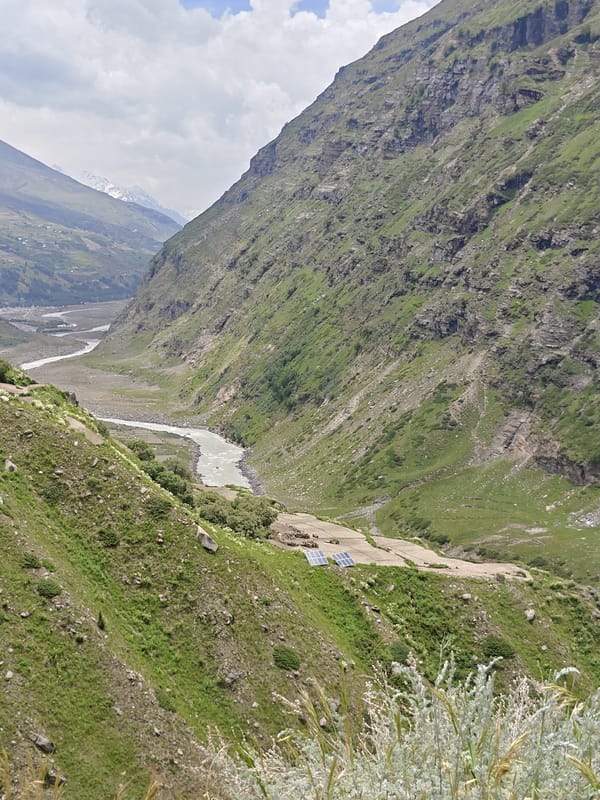Motorcycle ride through remote Himalayan mountain roads, early morning