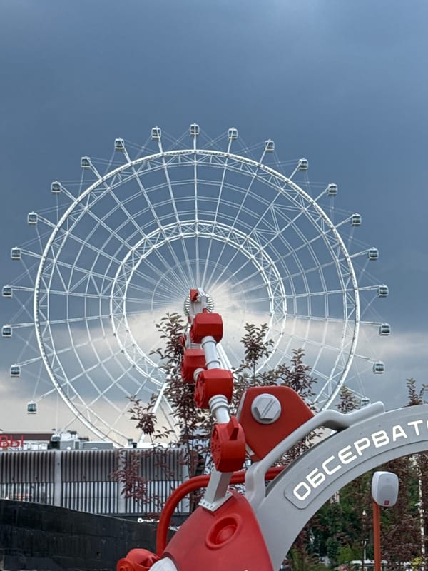Ferris wheel and playground structures in Khimki