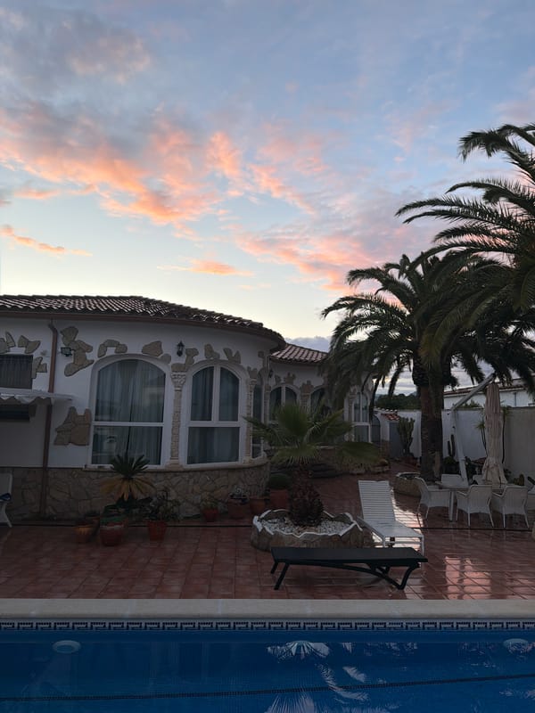 Evening poolside scene photographed in Mont-roig del Camp, Spain