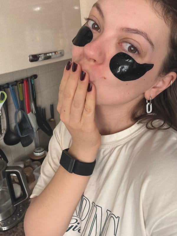 Woman's Self-Care Moment Documented in Khimki Kitchen Area