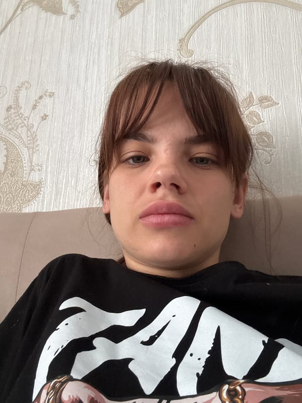 Woman takes multiple selfies on bed in Rostov-on-Don