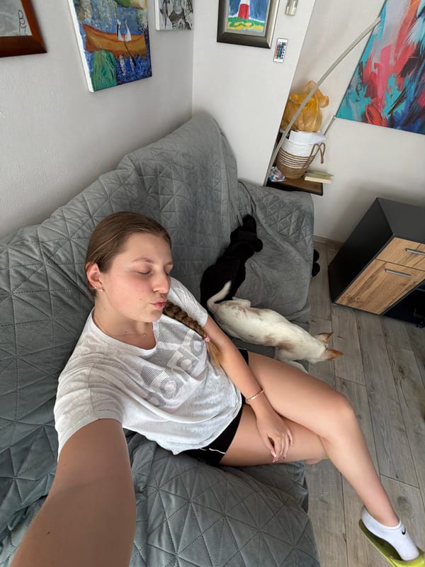 Young woman documents leisurely afternoon with pet dog in Burgas