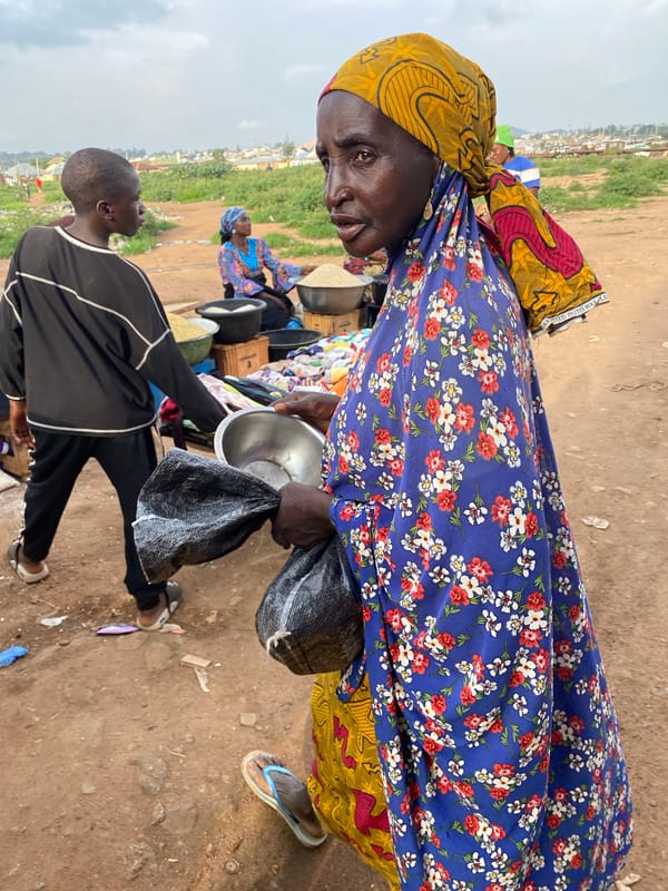 Daily life unfolds across Bukuru, Nigeria streets and markets