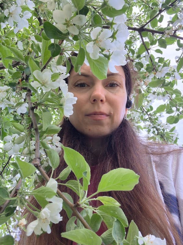 Woman spends quiet moments in urban park setting