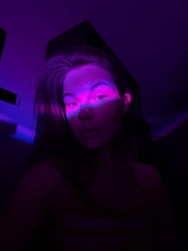 Woman filmed in colorful lighting session in Belgrade suburb