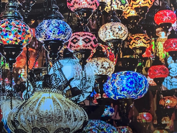 Lanterns, street art, and a cracked road — loosely connected snapshots