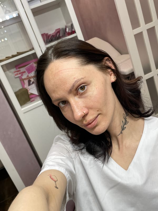 Tattooed woman captures selfie in Izhevsk