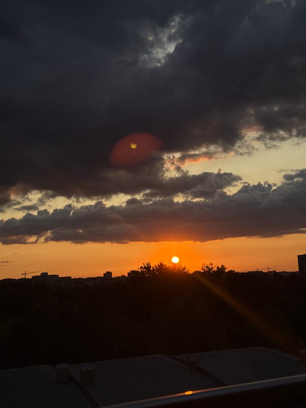 Stormy sunset over Sofia with a helicopter in flight