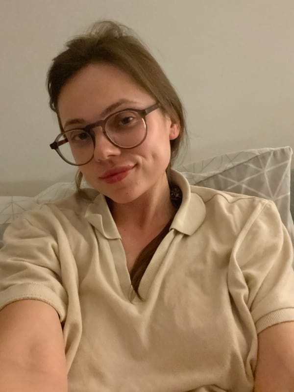 Woman rests on pillow in Hévíz, Hungary