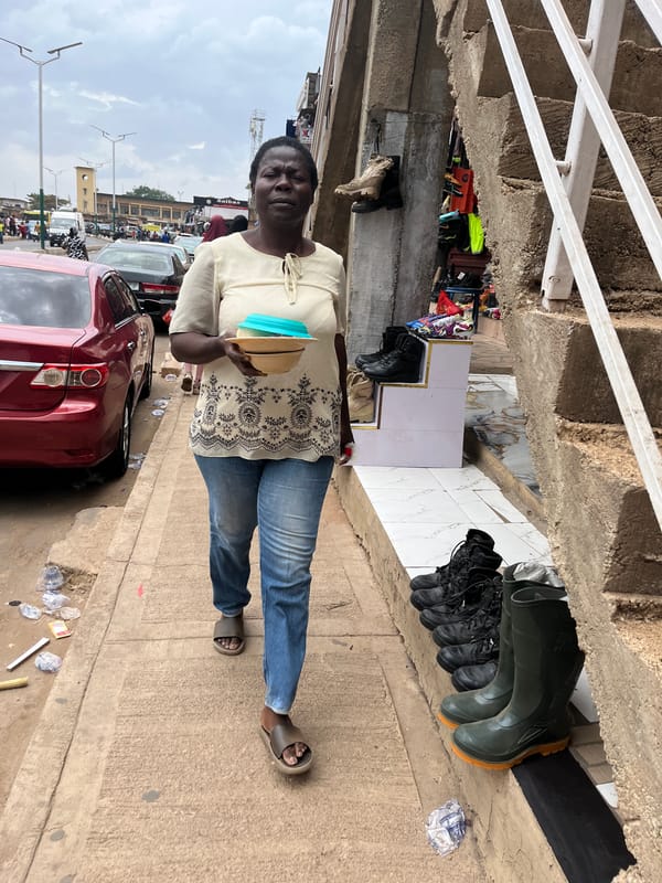 Daily life unfolds across Jos, Nigeria streets and markets