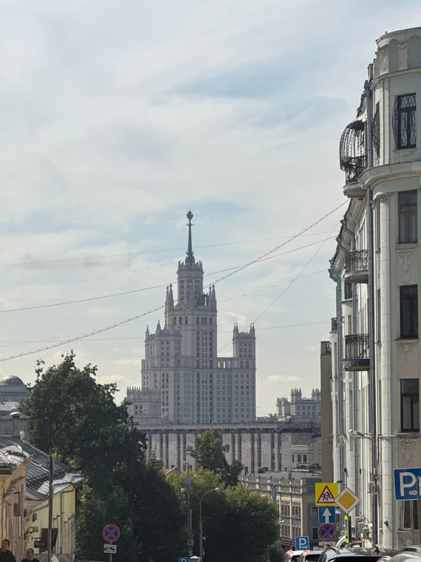 Moscow street scene with Stalinist skyscraper looming large