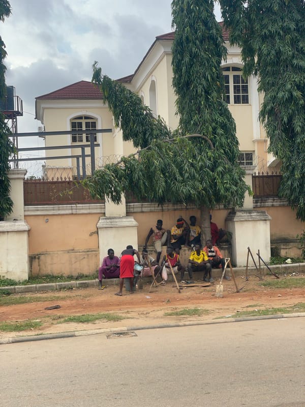 Afternoon street life along Guzape's roads, Abuja