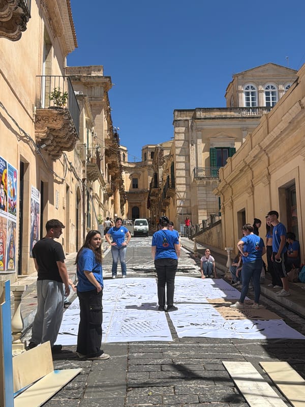 Street art project unfolds on cobblestones in Noto, Italy