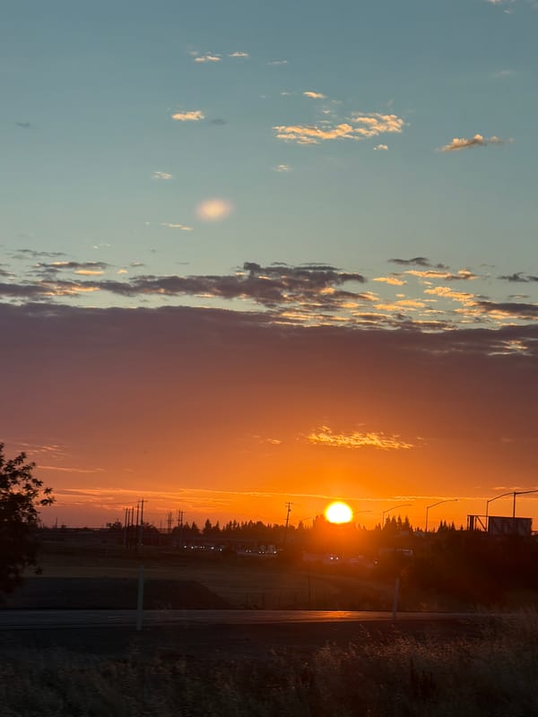 Fiery Sacramento sunset paints the sky orange and pink
