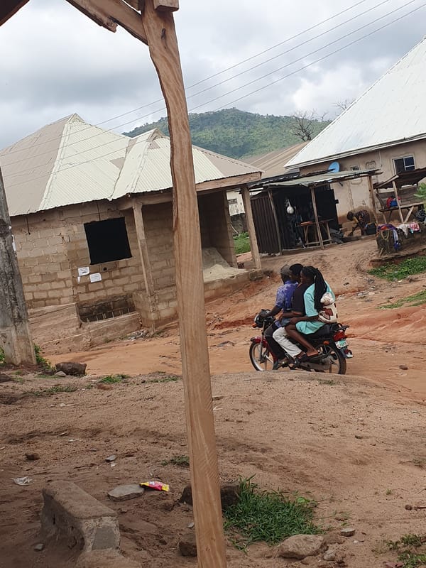 Outdoor pool game documented in Lokoja, Nigeria streets