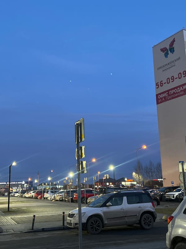 Evening selfies captured on Tyumen street at dusk