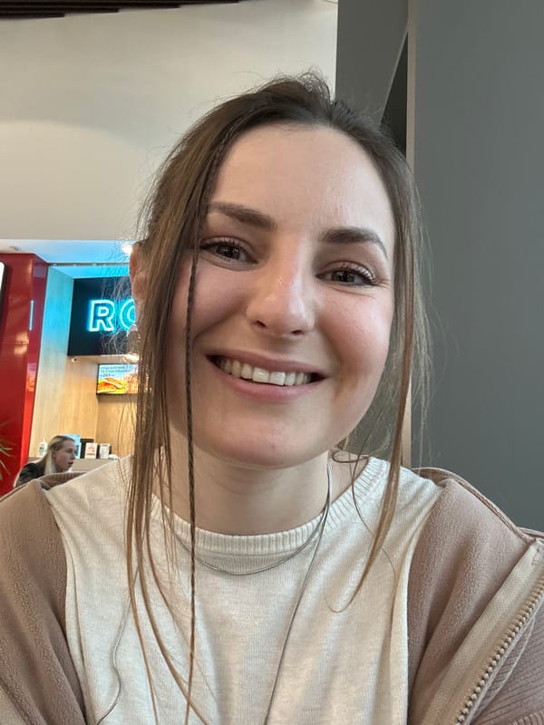 Woman takes selfie in retail store