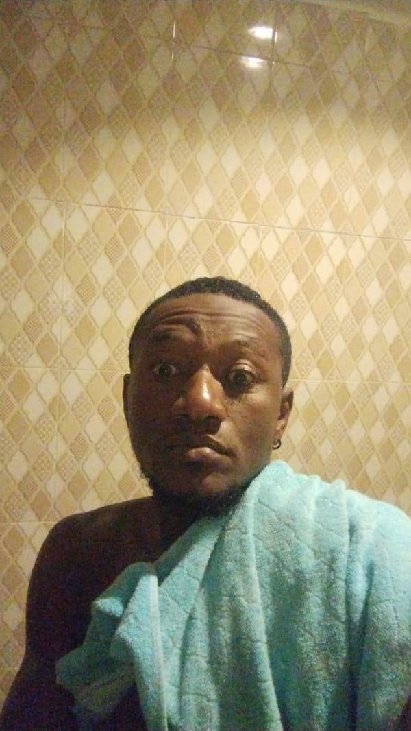 Man's evening bathroom routine documented in Jos, Nigeria