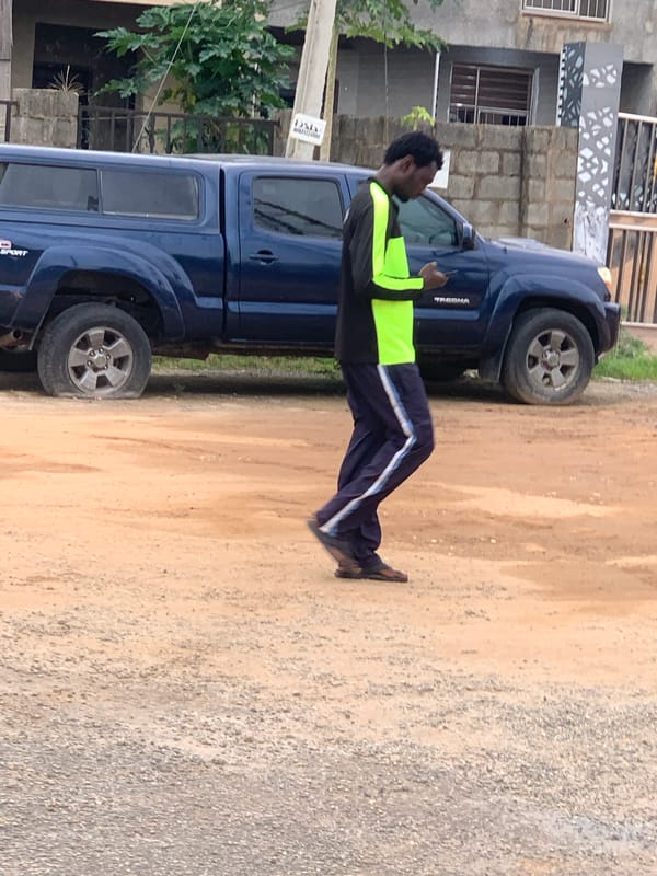 Morning street activity on a quiet road in Abuja