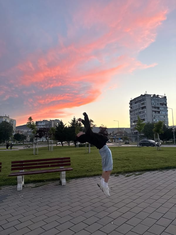 Acrobat performs sunset backflips in Shumen, Bulgaria park