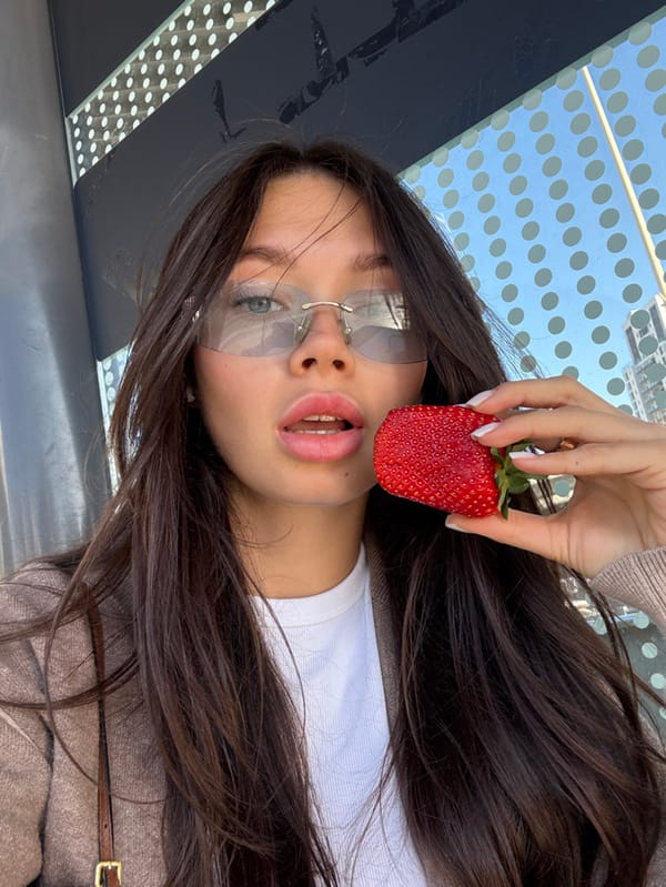 Woman films herself at transit stop in Petah Tikva