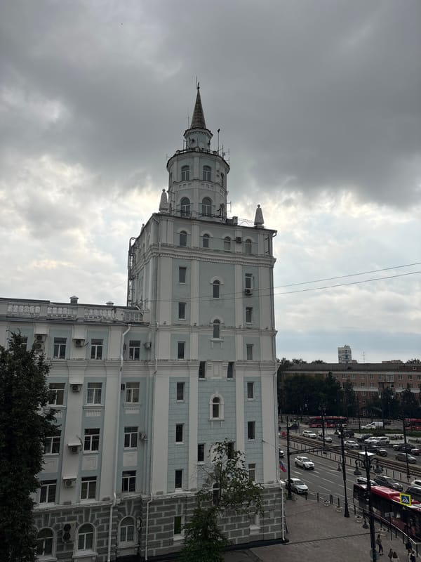 Street scenes, transit, and city views across central Perm