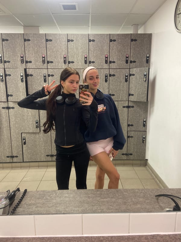 Two women take selfie in UK locker room