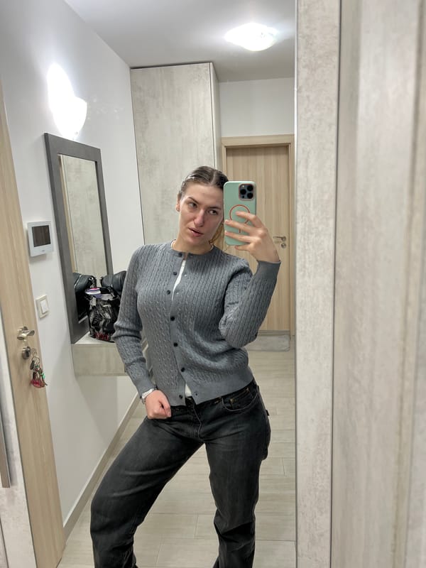 Woman takes morning mirror selfies in Sofia apartment