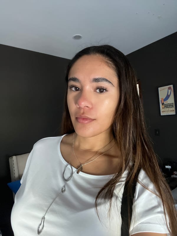 Woman takes indoor selfies in San Bernardino Tlaxcalancingo, Mexico